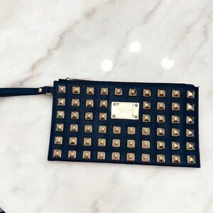 Michael Kors blue wristlet or wallet with studs